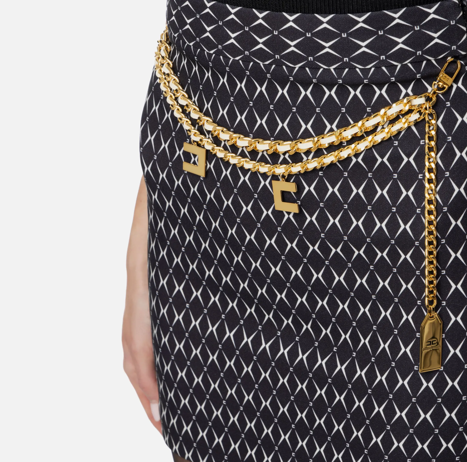 Elisabetta Franchi Tailleur|Skirts|Crêpe miniskirt with diamond print and chain Black/Butter